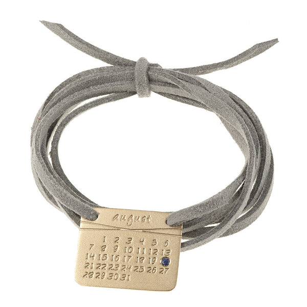 the calendar bracelet<sup>®</sup> in yellow or white gold