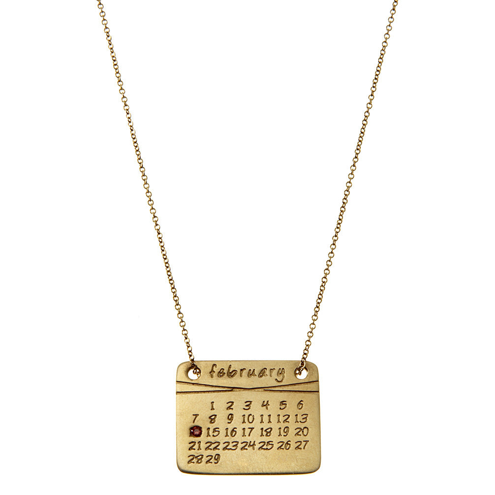 the calendar necklace<sup>®</sup> in yellow or white gold