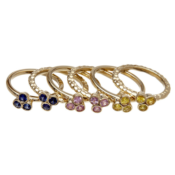 the portafortuna stacking rings in yellow gold with yellow sapphires